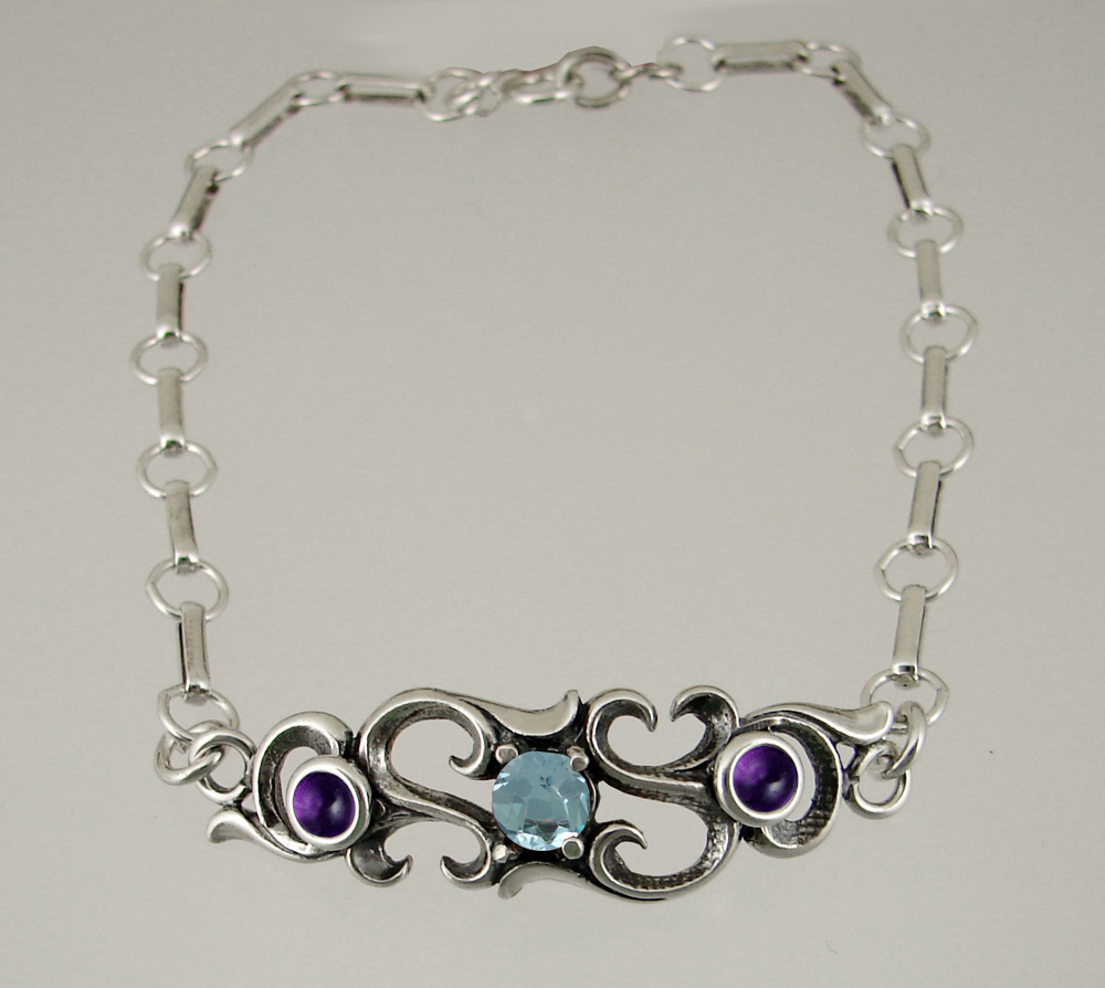 Sterling Silver Bracelet With Faceted Blue Topaz And Amethyst